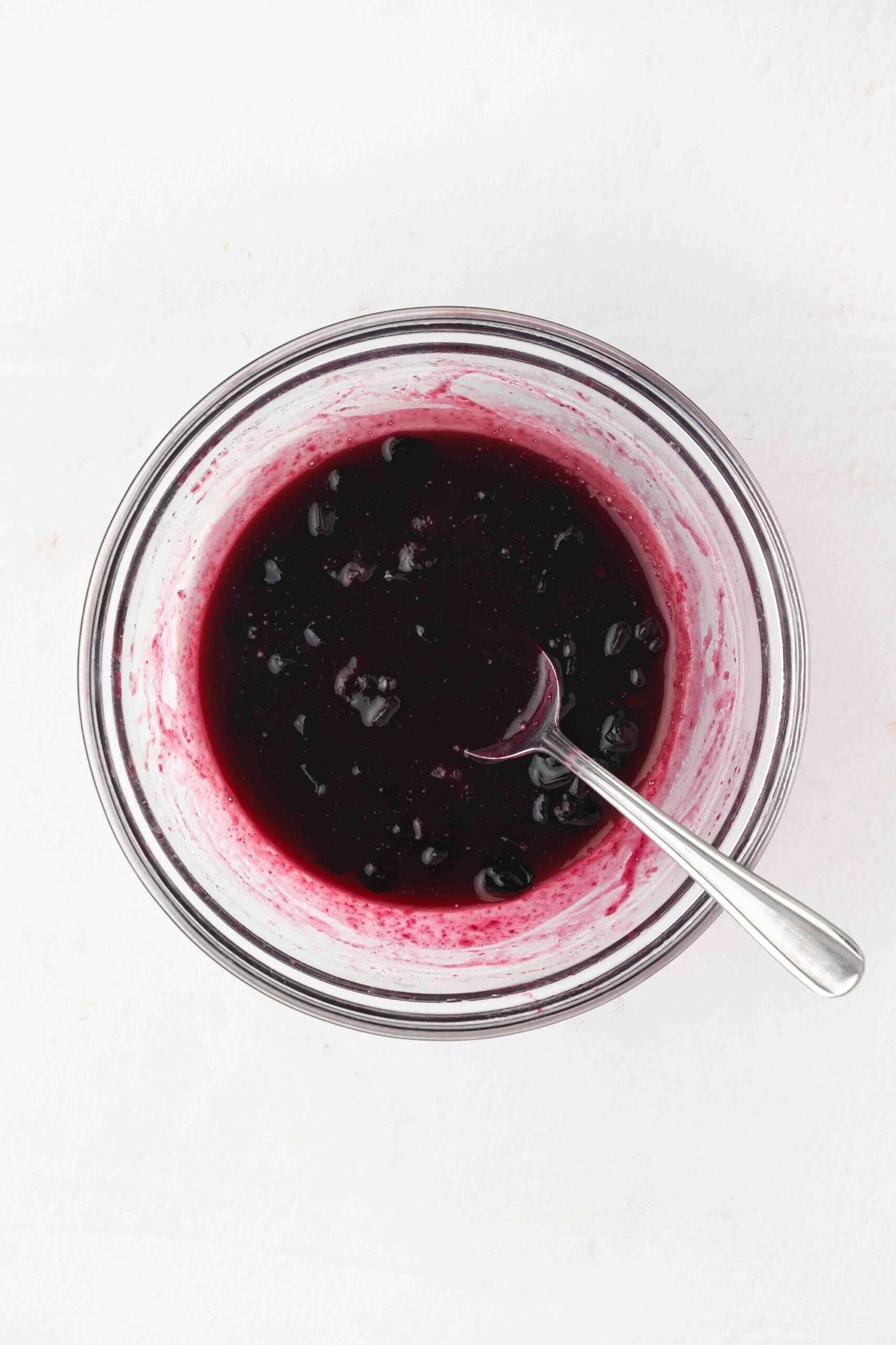 microwaved blueberry sauce, with spoon on it