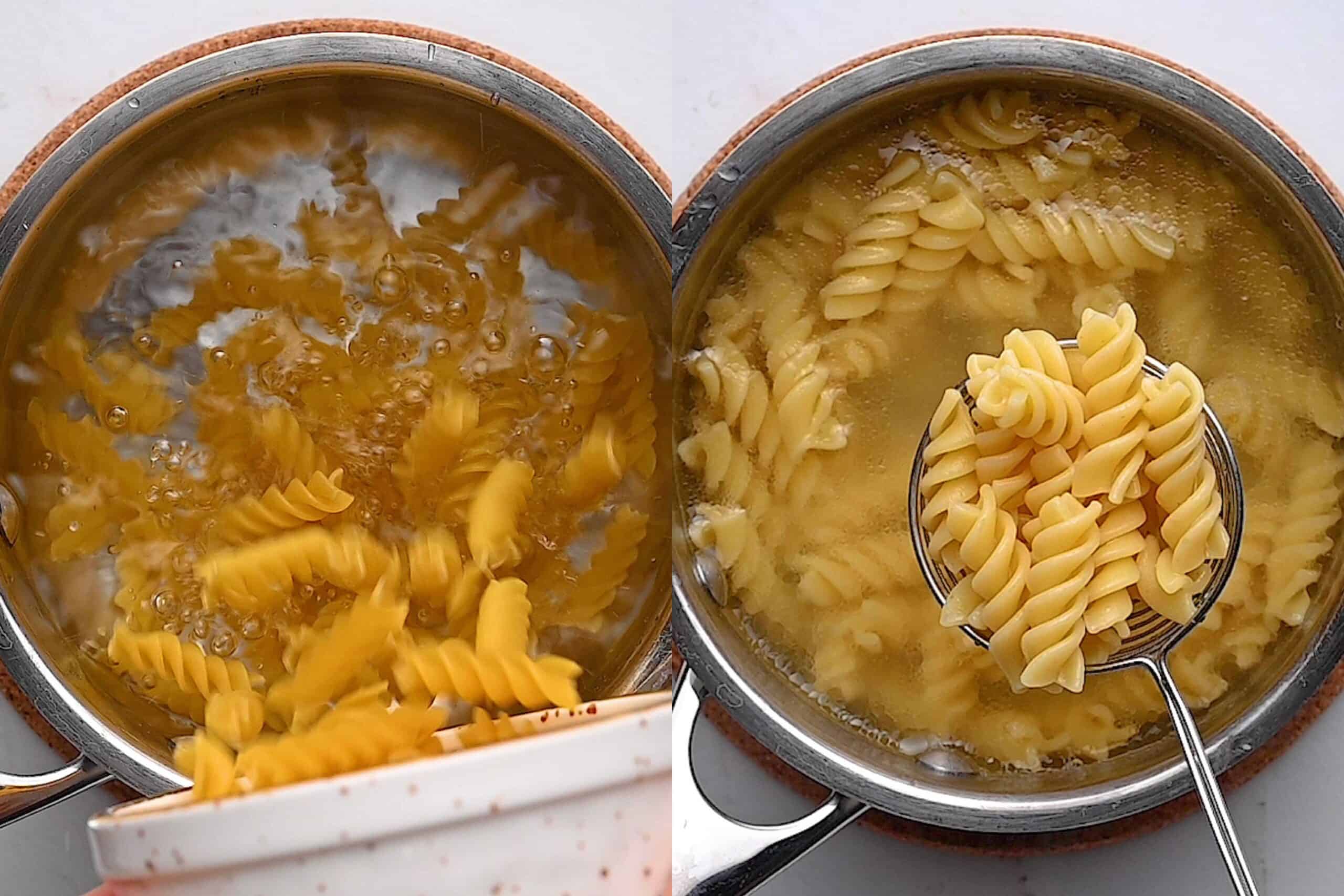 A pot of rotini pasta boiling in water on the stovetop.