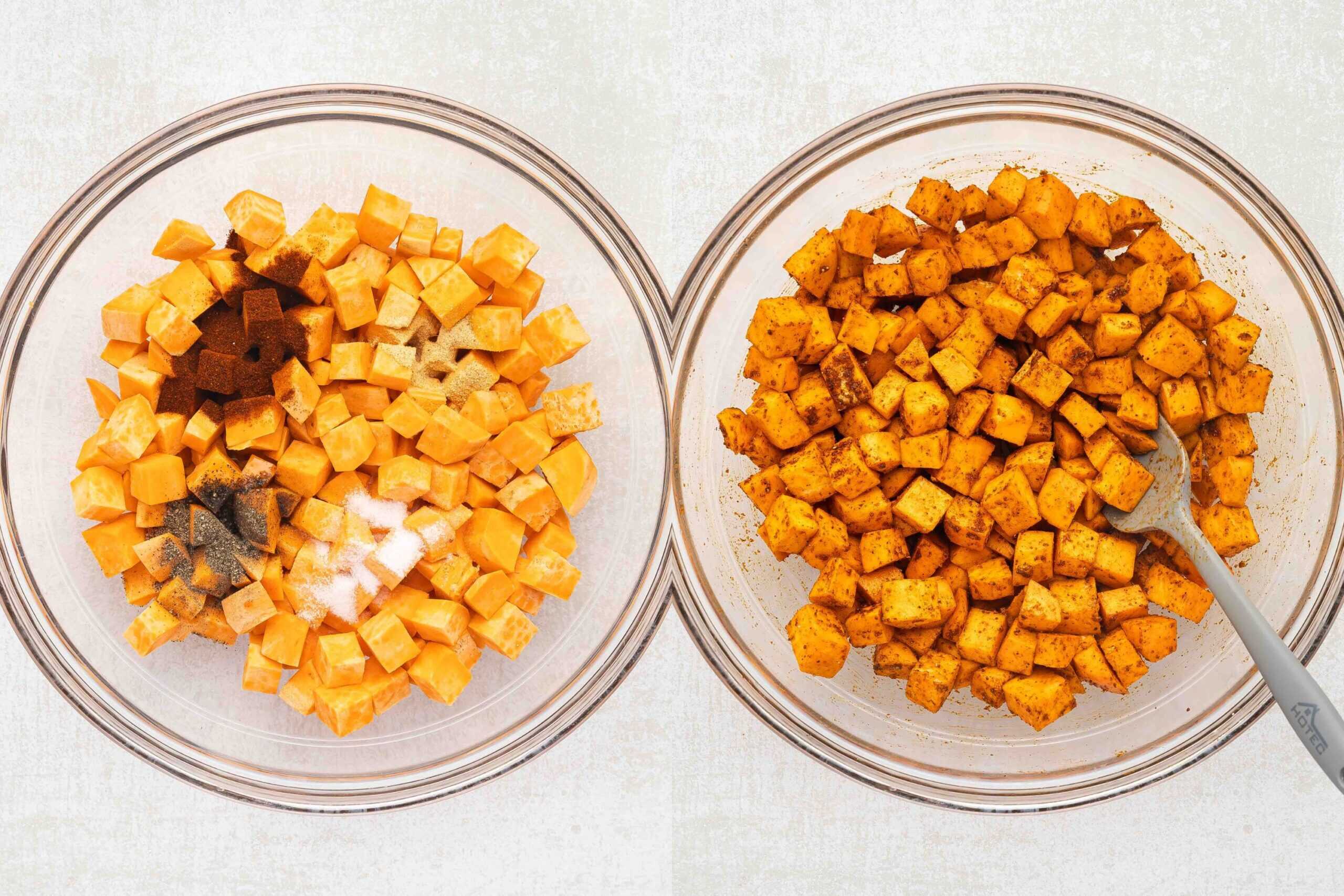 Sweet potato cubes tossed with olive oil and spices in a bowl.