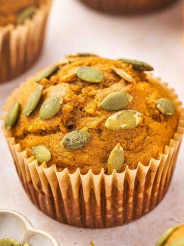Close-up side view of soft banana pumpkin muffins ready to serve